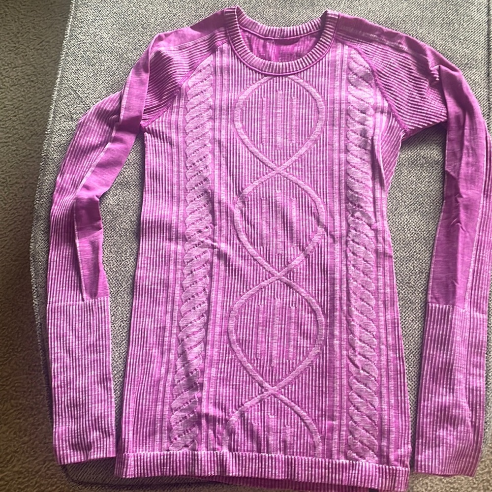 TWO Lululemon shirts. Thicker than swiftly. Has thumb holes. GUC. Size 4.